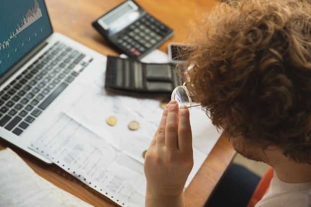 A person reviewing tax documents related to employee stock options, with a calculator and pen nearby, suggesting careful financial planning.